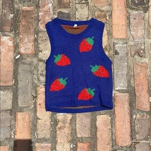 Blue sweater with strawberry design